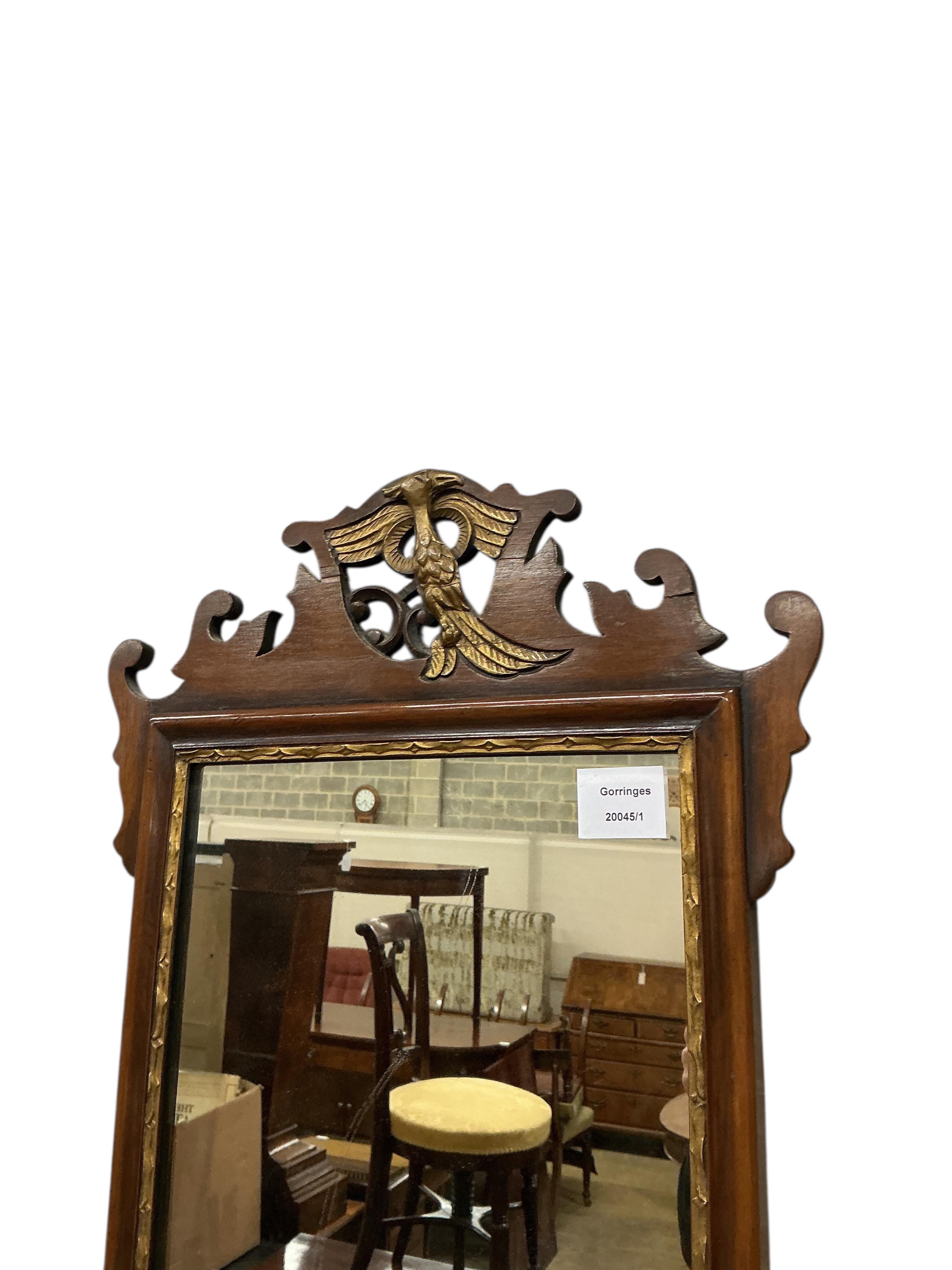 A George III style mahogany fret cut wall mirror, width 38cm, height 68cm